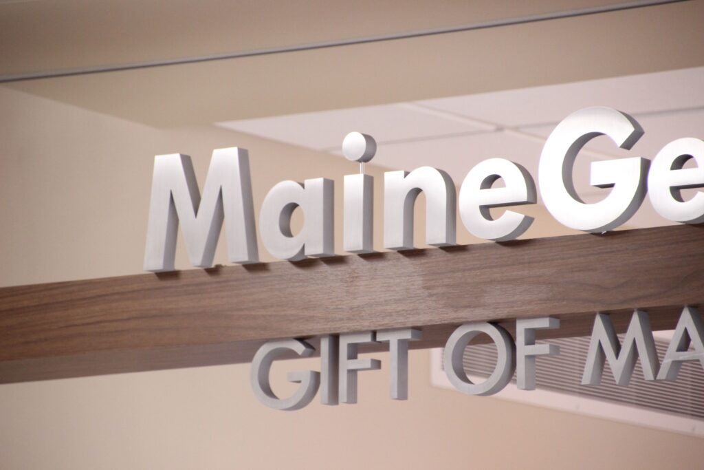 maine general health dimensional letter logo